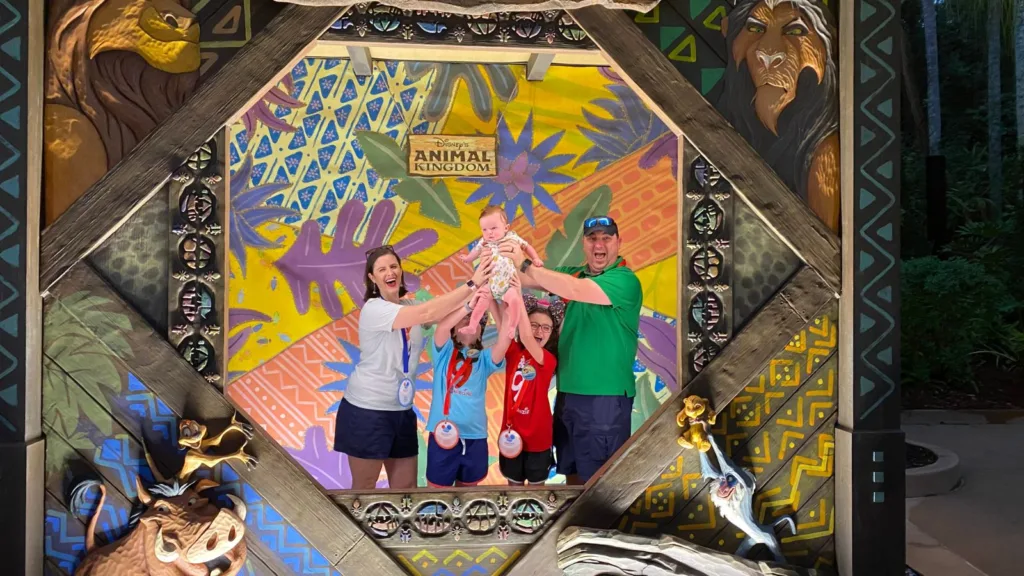 Family photos are one of the must-do tips for visiting Disney with a baby