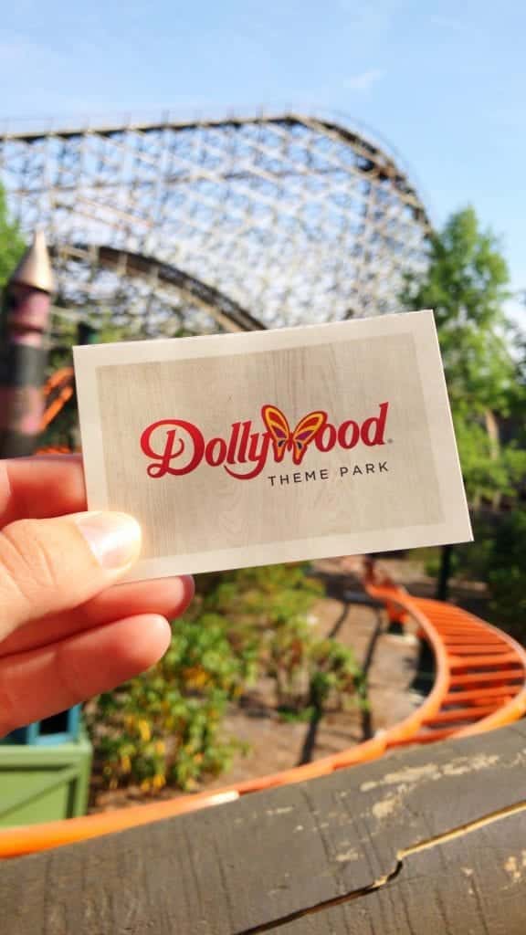 Holding up at ticket for Dollywood theme park