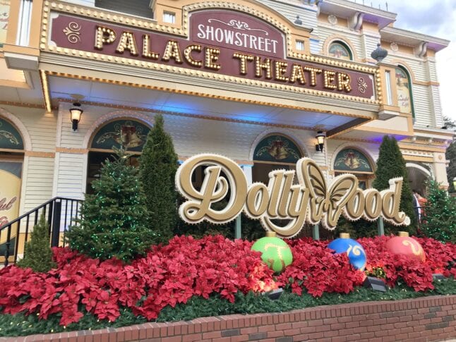 Dollywood entrance sign decorated for Christmas.