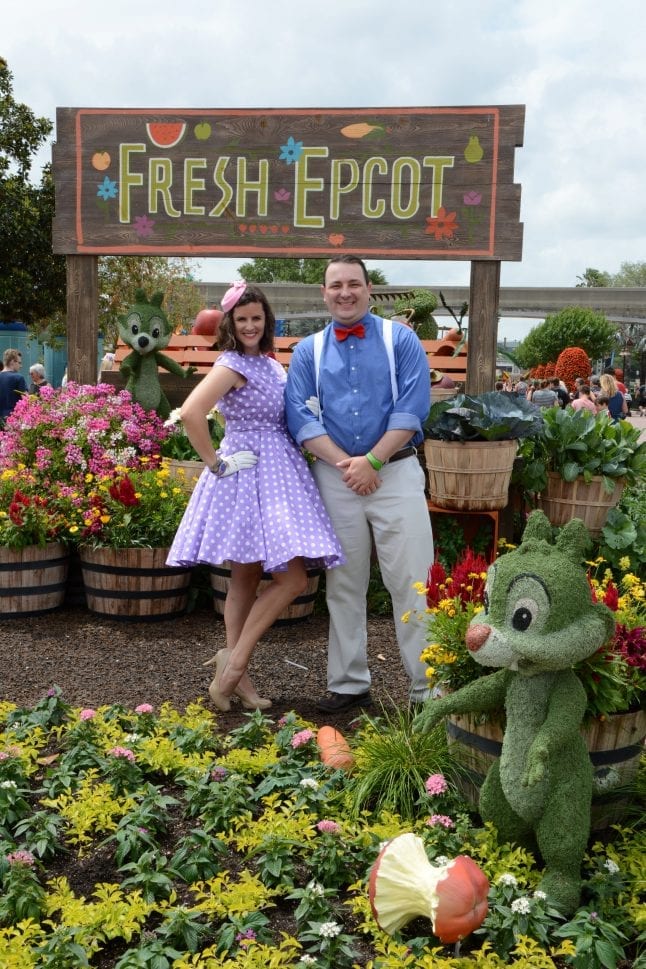 Woman and man couple Disneybounding as Daisy and Donald Duck.