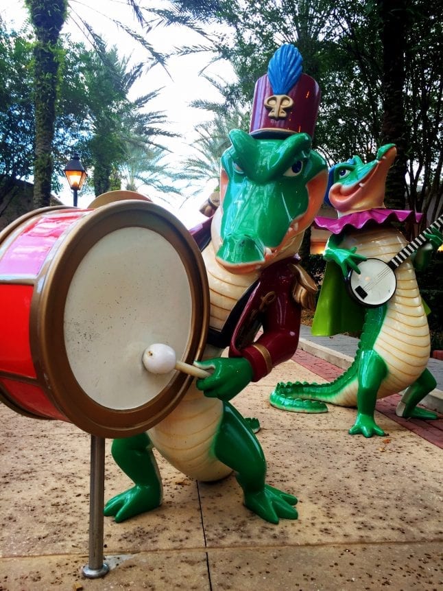 Whimsical alligator statues outside the Port Orleans French Quarter pool