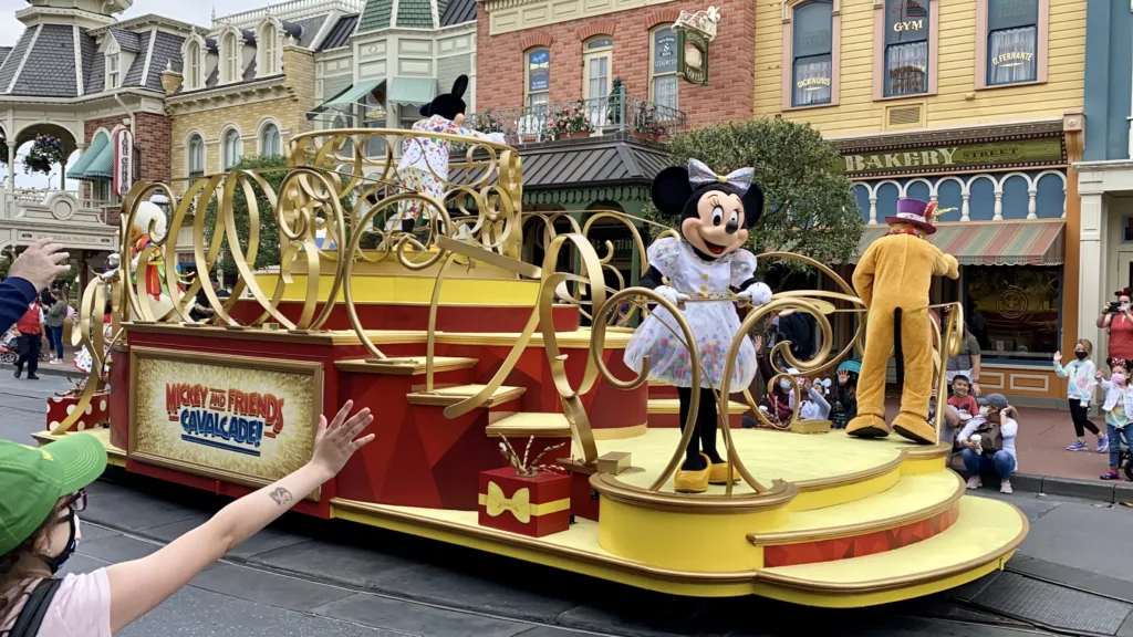 Disney characters riding on a parade float.